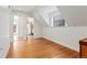 Bright bedroom with hardwood floors and an en suite bathroom at 2829 N Franklin St, Denver, CO 80205