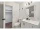 Updated bathroom featuring a modern vanity, mirror, and lighting fixture at 7755 E Quincy Ave # 301A2, Denver, CO 80237