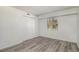 Bedroom featuring spacious closet space and a bright window at 7755 E Quincy Ave # 301A2, Denver, CO 80237