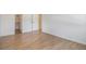 Bright room featuring closet space and new flooring at 7755 E Quincy Ave # 301A2, Denver, CO 80237