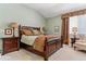 Warm and inviting main bedroom with ample space and a comfortable seating area at 3860 S Elkhart St, Aurora, CO 80014