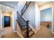 Staircase leading to lower level of home at 10538 Red Spruce Ct, Littleton, CO 80126