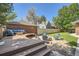 A spacious backyard with a deck and a seating area at 2836 Cherry St, Denver, CO 80207