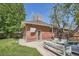 Exterior of the property and a spacious patio with outdoor seating at 2836 Cherry St, Denver, CO 80207