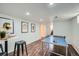 The basement features a ping pong table and bar space with stool seating at 2836 Cherry St, Denver, CO 80207
