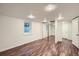 Bright bedroom features a large closet with sliding mirrored doors at 2836 Cherry St, Denver, CO 80207