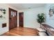 Stylish entryway with hardwood floors and decorative details, offering a warm welcome at 2836 Cherry St, Denver, CO 80207