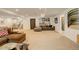 Large finished basement with ping pong, seating, and stylish decor at 3436 W 154Th Ave, Broomfield, CO 80023