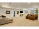 Spacious finished basement with cozy couches and entertainment area at 3436 W 154Th Ave, Broomfield, CO 80023