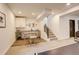 Finished basement area featuring a bar and staircase at 3436 W 154Th Ave, Broomfield, CO 80023