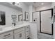 Modern bathroom features a walk-in shower with subway tile and glass door at 3436 W 154Th Ave, Broomfield, CO 80023