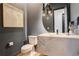 Modern powder room with decorative mirror, contemporary vanity, and stylish fixtures at 3436 W 154Th Ave, Broomfield, CO 80023