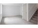 Spacious basement area with carpeted floors and ample room for customization and entertainment at 4264 Thorndyke Pl, Broomfield, CO 80020