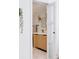 Modern bathroom with updated vanity, lighting, mirrors and fixtures at 4264 Thorndyke Pl, Broomfield, CO 80020