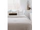 Bright bedroom featuring neutral decor, a large window, and minimalist design at 4264 Thorndyke Pl, Broomfield, CO 80020