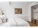 Bright bedroom featuring neutral decor, a large closet, and wood floors at 4264 Thorndyke Pl, Broomfield, CO 80020
