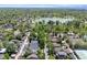 Aerial view of the house in a neighborhood near a lake, parks, and green spaces at 449 S Humboldt St, Denver, CO 80209