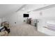 Bonus room with neutral carpet, TV, built-in shelves and play area for  at 449 S Humboldt St, Denver, CO 80209
