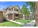 Beautifully landscaped home with a manicured lawn, mature trees, and inviting curb appeal at 449 S Humboldt St, Denver, CO 80209