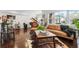 Spacious living room with hardwood floors, stylish furniture, and bright natural light at 449 S Humboldt St, Denver, CO 80209