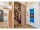 Entry closet with sliding doors offers ample storage space for coats and accessories at 13635 E Bates Ave # 406, Aurora, CO 80014