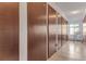 Long hallway with numerous storage spaces for residents at 13635 E Bates Ave # 406, Aurora, CO 80014