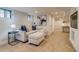 Cozy basement living area featuring neutral tones, plush seating, and an airy, inviting atmosphere at 840 S Corona St, Denver, CO 80209