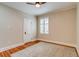 Simple bedroom with hardwood floors, ceiling fan and natural light at 840 S Corona St, Denver, CO 80209