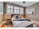 Inviting bedroom featuring natural light, neutral tones, and hardwood floors at 840 S Corona St, Denver, CO 80209