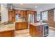 Modern kitchen with granite countertops, stainless steel appliances, and ample cabinet space at 840 S Corona St, Denver, CO 80209