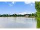 Scenic lake view with a building and trees in the background at 840 S Corona St, Denver, CO 80209