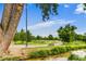 Scenic park with benches, a winding path, and water feature views at 840 S Corona St, Denver, CO 80209