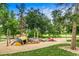 Fun playground with unique insect-themed play structures and swings at 840 S Corona St, Denver, CO 80209