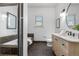 This bathroom has a tub, vanity, toilet, and window at 624 E 18Th Ave # 3, Denver, CO 80203