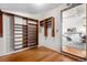 Walk-in closet with wood floors and convenient shelving at 624 E 18Th Ave # 3, Denver, CO 80203