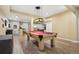 Finished basement features a game room and bar area, perfect for entertaining at 2601 S Kipling Ct, Lakewood, CO 80227