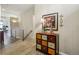 Hallway featuring warm tones and a decorative chest of drawers at 2601 S Kipling Ct, Lakewood, CO 80227