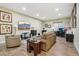 Spacious living room with recessed lighting, modern furniture and a dedicated office space at 2601 S Kipling Ct, Lakewood, CO 80227