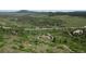 Lush green landscape featuring winding trails through fields and foliage, promising outdoor adventures at 8821 S Perry Park Rd, Larkspur, CO 80118