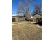 View of the property's fenced backyard, offering privacy and outdoor space at 2134 S Corona St, Denver, CO 80210