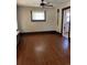 Bright living room with hardwood floors and a large window with natural light at 2134 S Corona St, Denver, CO 80210