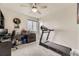 Bedroom with a computer, treadmill, and lots of space at 12749 Horton Ct, Parker, CO 80134