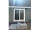 Sliding back door leading to a patio or backyard, offering seamless indoor-outdoor living at 5060 N Walden Way, Denver, CO 80249