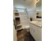 Well-lit bathroom with a shower, vanity, and a modern color scheme and plenty of natural light at 5060 N Walden Way, Denver, CO 80249
