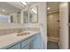 Bright bathroom featuring stylish finishes, a glass door shower, and modern fixtures at 1777 Larimer St # 2201, Denver, CO 80202