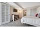 This lovely bedroom provides ample space, a dresser, and a well-lit closet for storage at 1777 Larimer St # 2201, Denver, CO 80202