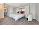 Comfortable bedroom featuring built-in storage and a lovely view of the en-suite bathroom at 1777 Larimer St # 2201, Denver, CO 80202