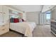 Spacious main bedroom featuring ample closet space and an attached balcony with city views at 1777 Larimer St # 2201, Denver, CO 80202