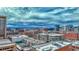 Wide city view showcasing rooftops and cityscape against a cloudy sky at 1777 Larimer St # 2201, Denver, CO 80202