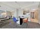 Dining area with contemporary furnishings next to an open kitchen at 1777 Larimer St # 2201, Denver, CO 80202